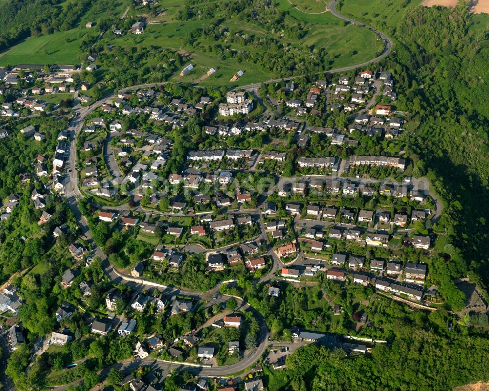 Aerial image Lahnstein - Residential area in the East of Lahnstein in the state Rhineland-Palatinate. The town is located in the county district of Rhine-Lahn, at the mouth of the river Lahn into the river Rhine. The spa resort includes thermal spas and health centres and sits in the UNESCO world heritage site of Upper Middle Rhine Valley. The residential area is located on a hill in the East of the town centre, surrounded by forest and fields