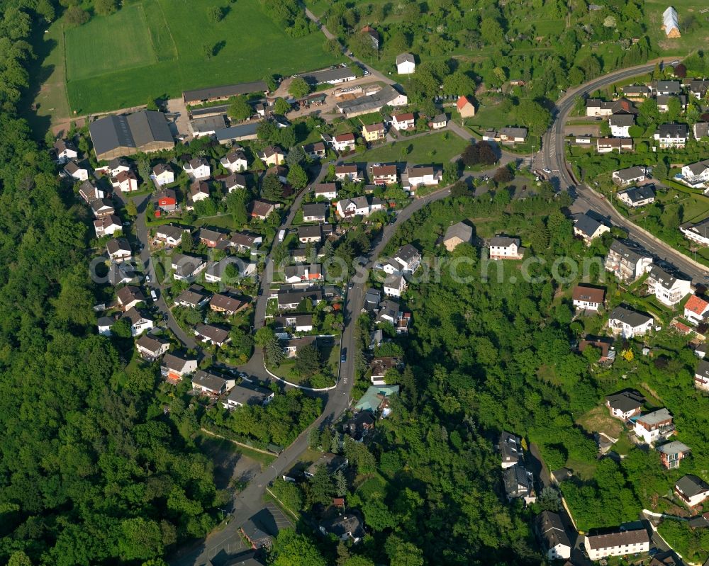 Aerial photograph Lahnstein - Residential area in the East of Lahnstein in the state Rhineland-Palatinate. The town is located in the county district of Rhine-Lahn, at the mouth of the river Lahn into the river Rhine. The spa resort includes thermal spas and health centres and sits in the UNESCO world heritage site of Upper Middle Rhine Valley. The residential area is located on a hill in the East of the town centre, surrounded by forest and fields