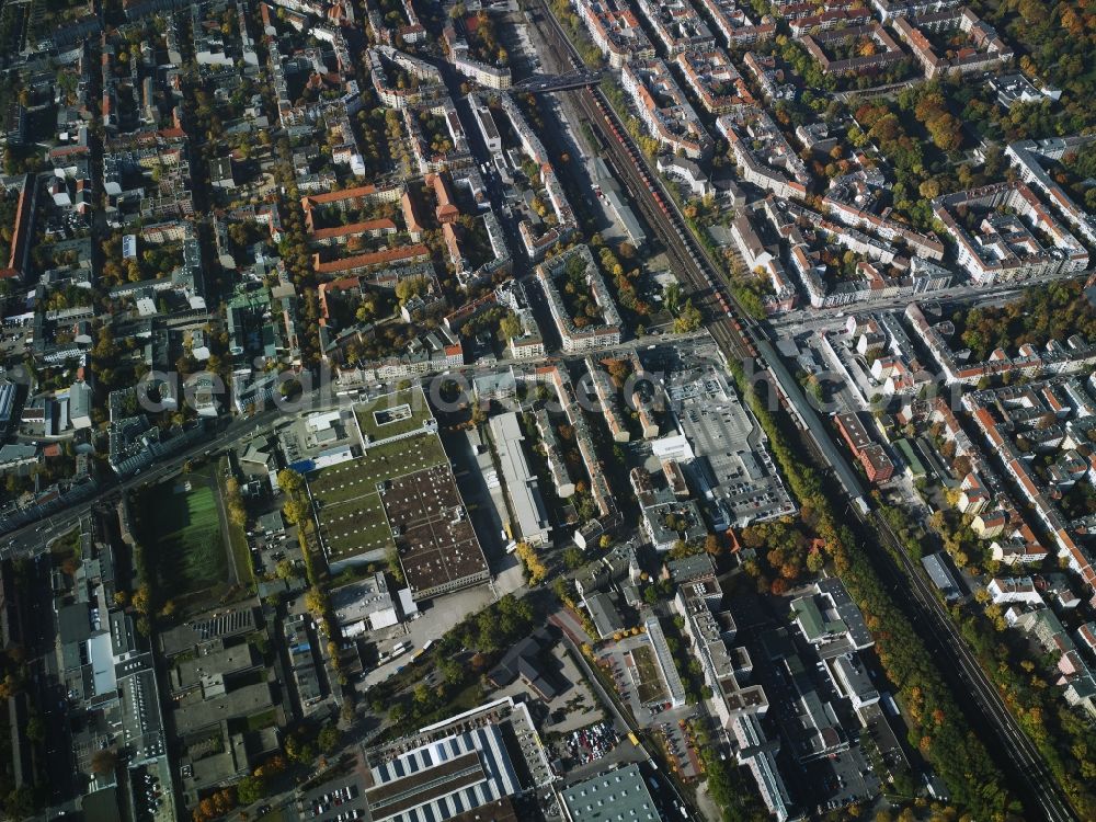 Berlin from the bird's eye view: Residential area on Ringbahn rail line in the North of the Britz part of the district of Neukoelln in Berlin in Germany. The area is bordered by Karl-Marx-Strasse in the East and a commercial area