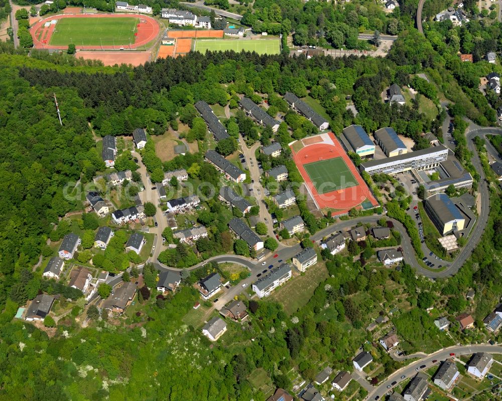 Aerial image Mayen - Residential area and sports facilities in the North of Mayen in the state Rhineland-Palatinate. The town is located in the county district of Mayen-Koblenz in the Eifel region. The urban area is crossed by the river Nette. Mayen consists of a main town and four boroughs and districts