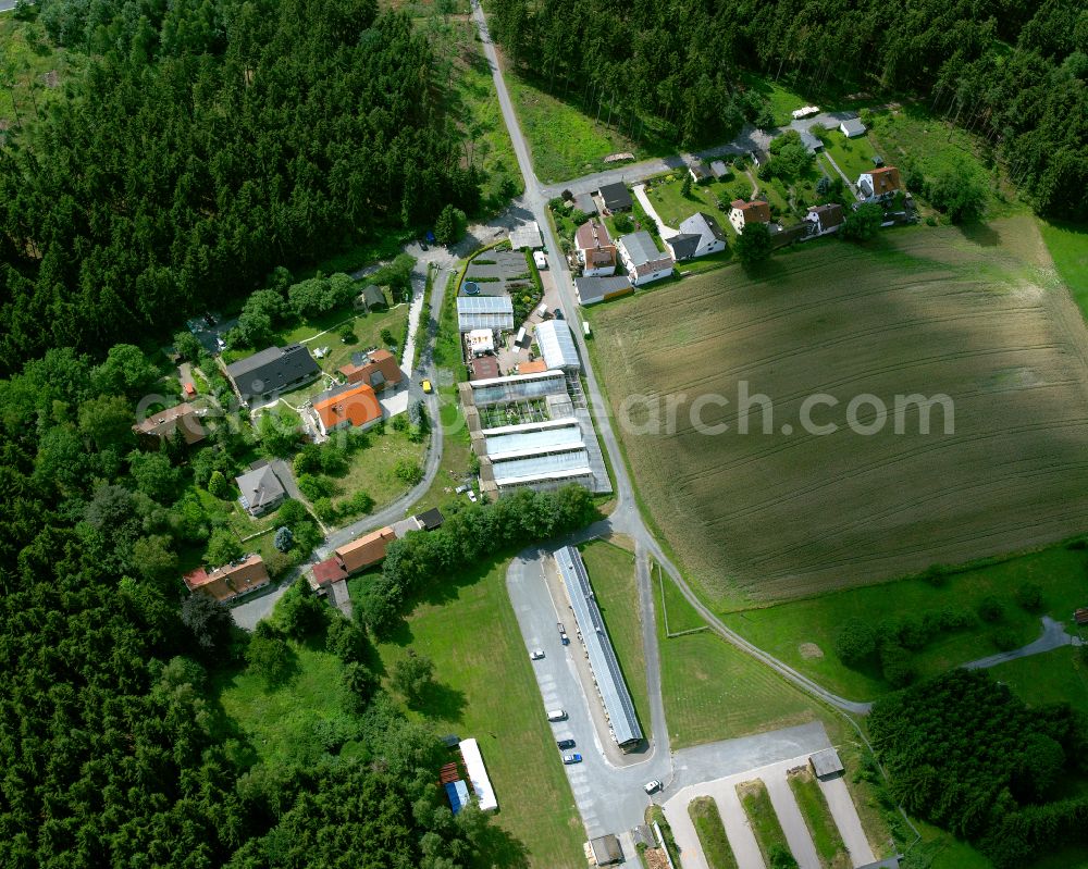 Jägersruh from the bird's eye view: Residential areas on the edge of forest areas in Jägersruh in the state Bavaria, Germany