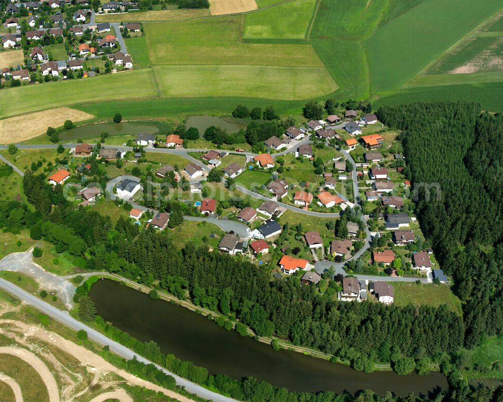 Aerial photograph Tauperlitz - Residential areas on the edge of forest areas in Tauperlitz in the state Bavaria, Germany