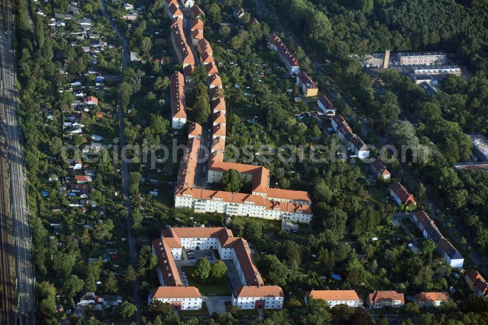 Berlin from above - Residential area with estates in the Johannisthal part of the district of Treptow-Koepenick in Berlin. The estates are located in the South of Rixdorfer Strasse and East of Suedostallee. They are surrounded by green areas, parks and allotments