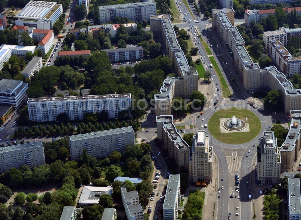 Aerial image Berlin-Friedrichshain - View of the Strausberger Platz with fountain in the district Friedrichshain of Berlin. The Strausberger Platz marks the border to the borough Mitte. The place was arranged 1967 after a fountain, designed by Fritz Kühn, had been constructed