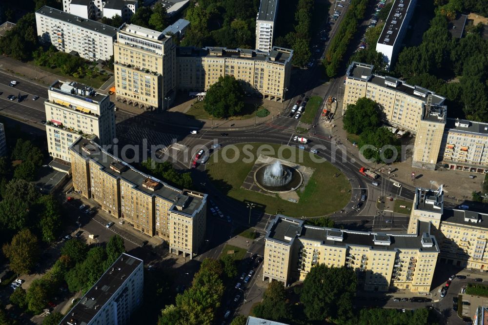 Berlin Friedrichshain from above - View of the Strausberger Platz with fountain in the district Friedrichshain of Berlin. The Strausberger Platz marks the border to the borough Mitte. The place was arranged 1967 after a fountain, designed by Fritz Kühn, had been constructed