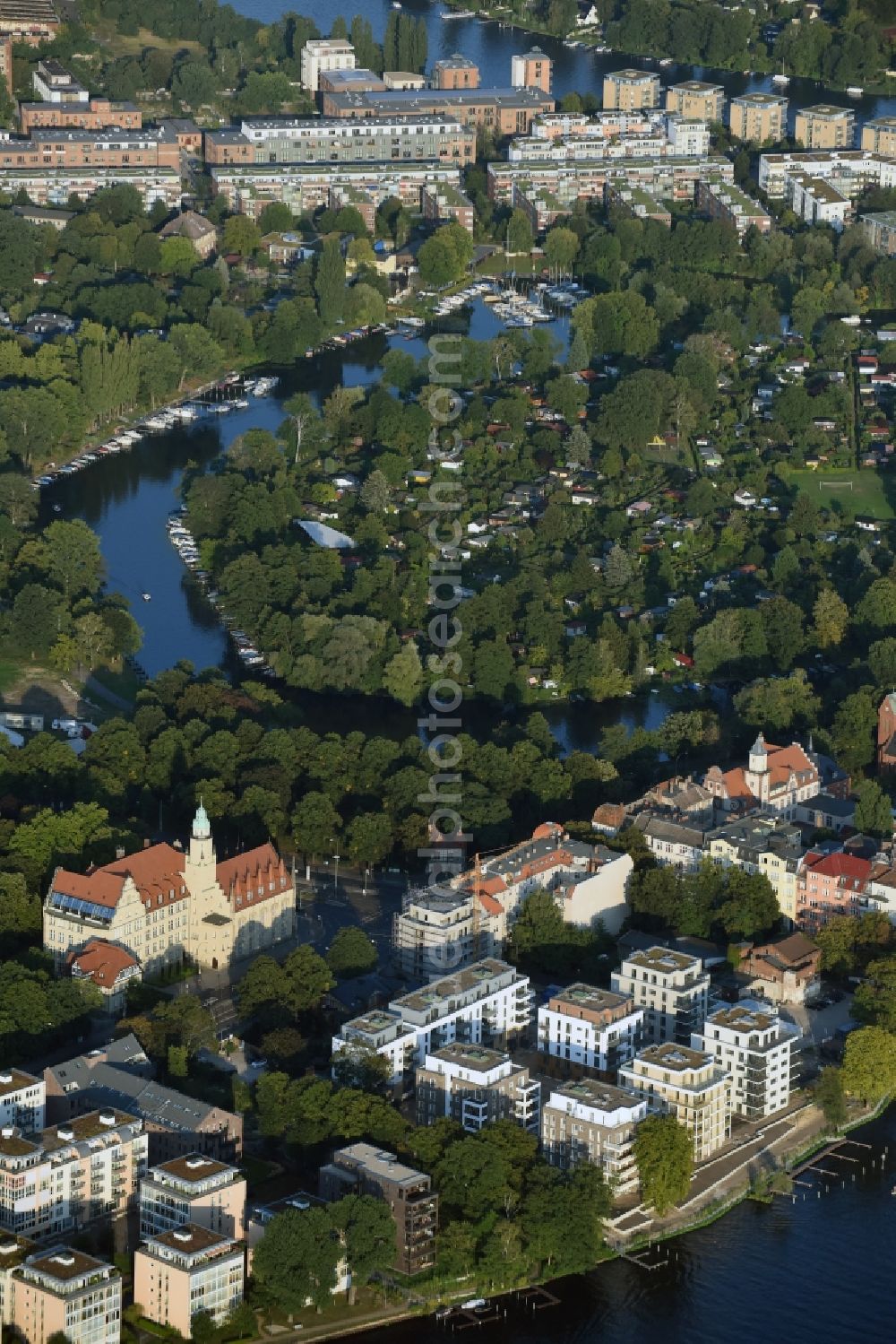 Aerial image Berlin - Settlement in the district Koepenick close to the river Spree in Berlin