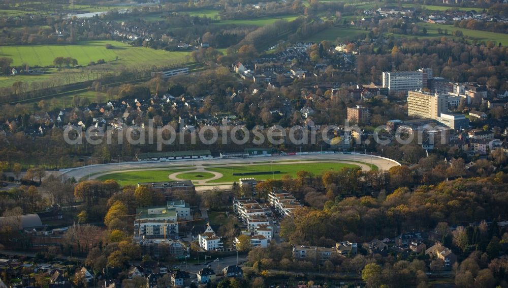 Dinslaken from above - Residential quarter Baerenkamp-Carrée in Dinslaken in the state North Rhine-Westphalia. The quarter is located in an autumnal forest