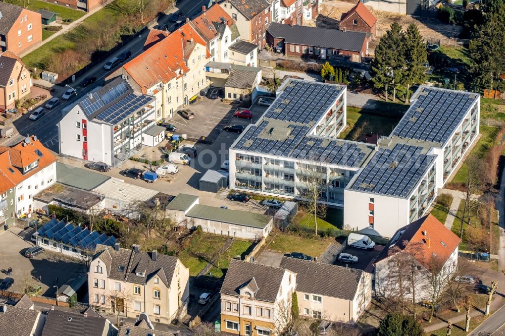 Aerial photograph Bönen - Settlement along the Bahnhofstrasse in Boenen in the state North Rhine-Westphalia, Germany