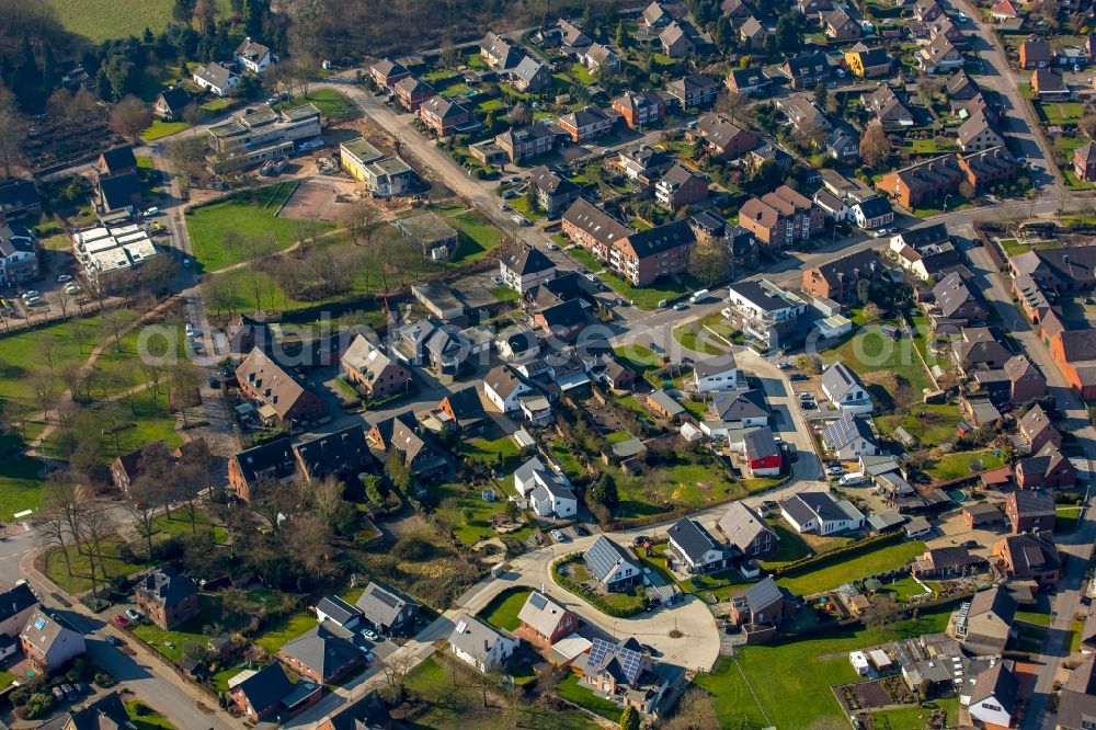 Rheurdt from the bird's eye view: Residential area along Rathausstrasse in Rheurdt in the state of North Rhine-Westphalia