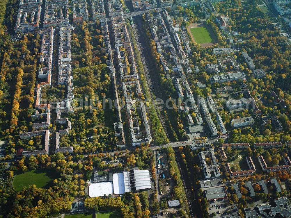 Aerial image Berlin - Settlement and the nearby railway station Hermannstrasse in the district Neukoelln in Berlin in Germany