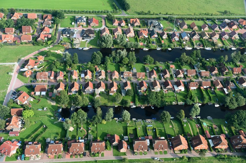 Aerial photograph Timmel - Settlement Oevert - canal to Timmeler Meer in Timmel in the state Lower Saxony