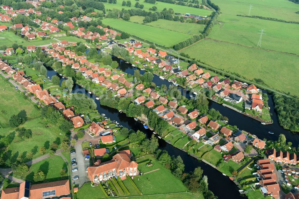 Timmel from above - Settlement Oevert - canal to Timmeler Meer in Timmel in the state Lower Saxony