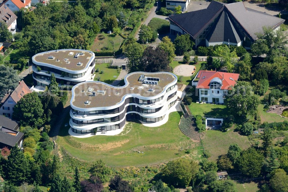 Stuttgart from the bird's eye view: Residential estate View on Memberg mountain in the Geiger residential area in Stuttgart in the state of Baden-Wuerttemberg. The estate consists of three buildings with balconies and round and bent architecture