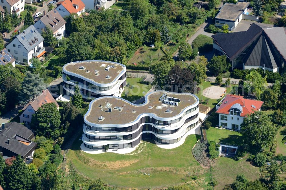 Aerial image Stuttgart - Residential estate View on Memberg mountain in the Geiger residential area in Stuttgart in the state of Baden-Wuerttemberg. The estate consists of three buildings with balconies and round and bent architecture