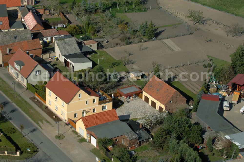 Aerial photograph Angern - Blick auf ein Wohnhaus / Einfamilienhaus an der Friedensstrasse 54 in 39326 Angern bei Wolmirstedt.