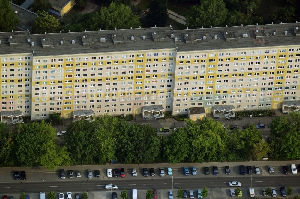 Berlin from above - Residential estate on Wendenschlossstrasse in the Koepenick part of the district of Treptow-Koepenick in Berlin. The multi-storey estate with the yellow-white facade is located in the North of the street and is surrounded by green spaces