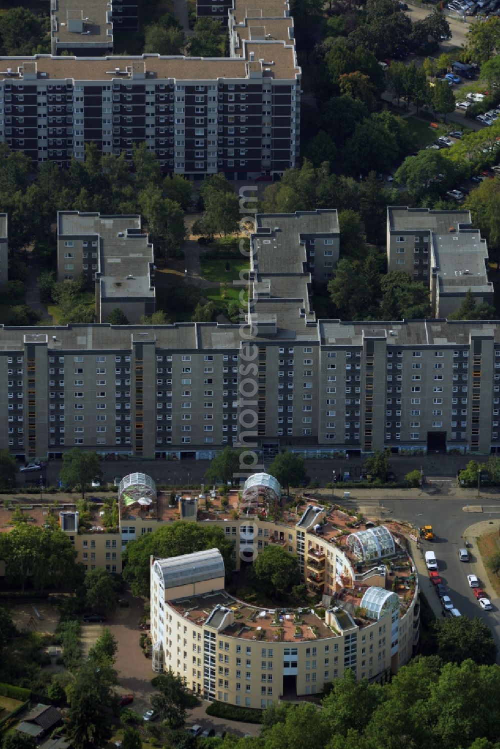 Aerial image Berlin - Residential building complex Snail on Ortolanweg in the Neukoelln part of Berlin. The architectural distinct building is located amidst a residential area with estates