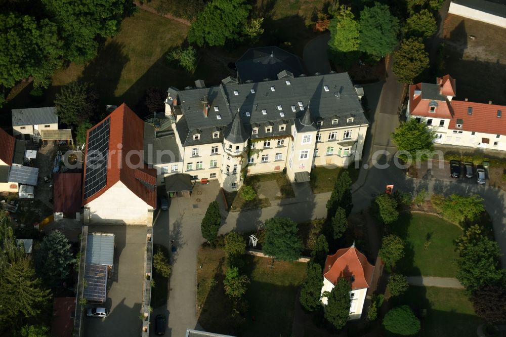 Zehringen from above - Home for disabled people Gut Zehringen in Zehringen in the state of Saxony-Anhalt. The estate and premises are located on site of a former agricultural mansion in the center of the village