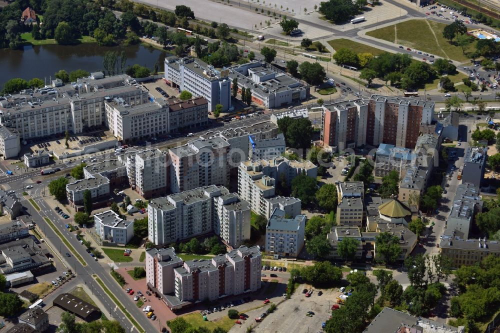 Warschau from above - Residential buildings and the church community Wincentengo Pallotti in the Praga Poludnie district in Warsaw in Poland. The estates and blocks of flats on the Skaryszewska street surround the Roman-Catholic community with its church and the green roof. Lake Kamionkowskie is located in the background