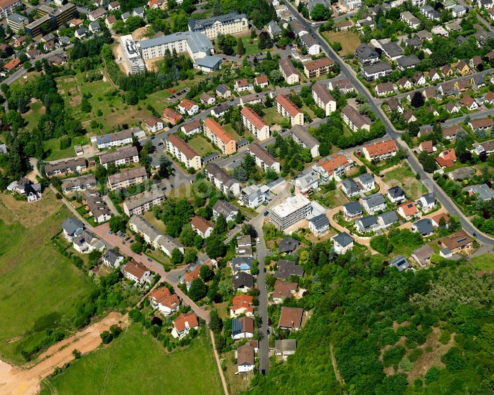 Bad Kreuznach from above - Residential buildings and areas in the South of Bad Kreuznach in the state of Rhineland-Palatinate. Bad Kreuznach is a spa town and county capital and is located on the rivers Nahe and Ellerbach. Several residential areas spread out along the Southern edge of the town, including multi-family units, single family houses and apartment buildings