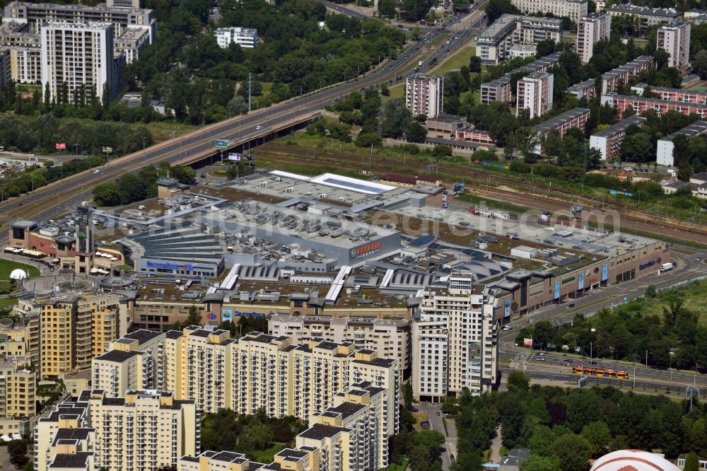 Aerial photograph Warschau - Residential area and buildings next to Arkadia Shopping Mall in downtown Warsaw in Poland. The high rise buildings are located south of the mall. The buildings are adjacent to the traffic junction Rondo Radoslawa