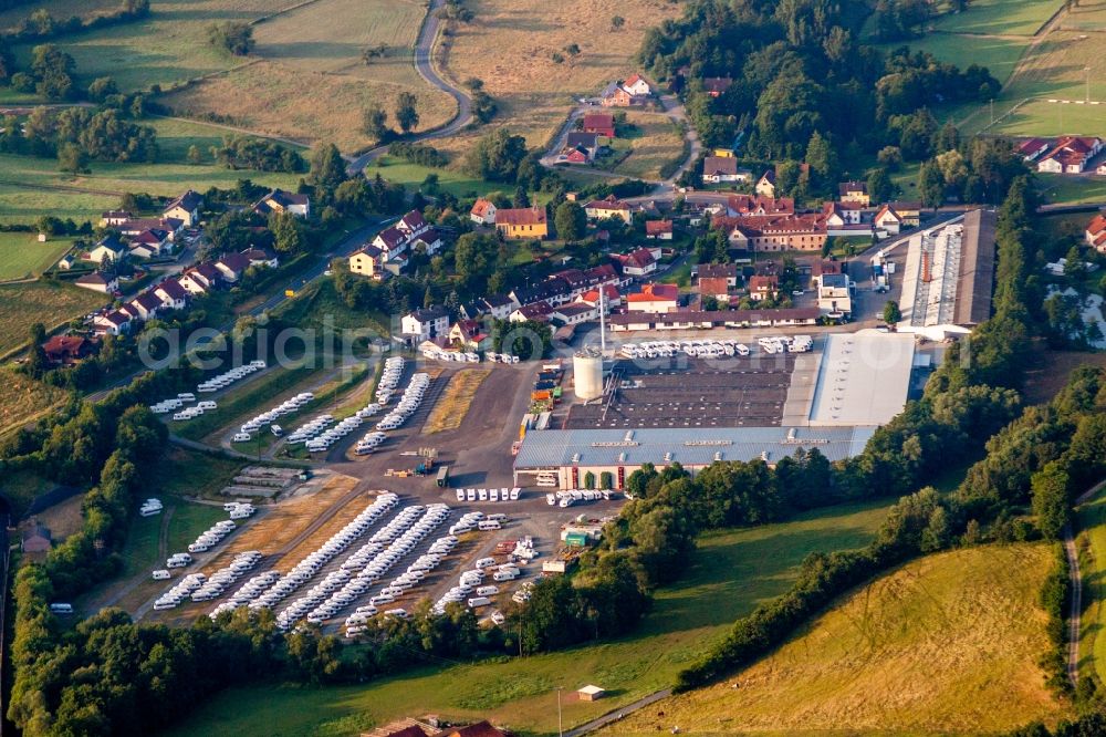 Sinntal from the bird's eye view: Buildings and production halls on the motorhome and caravan vehicle construction site Knaus Tabbert in Sinntal in the state Hesse, Germany