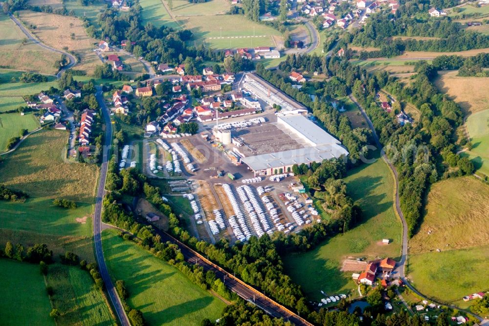 Aerial image Sinntal - Buildings and production halls on the motorhome and caravan vehicle construction site Knaus Tabbert in Sinntal in the state Hesse, Germany