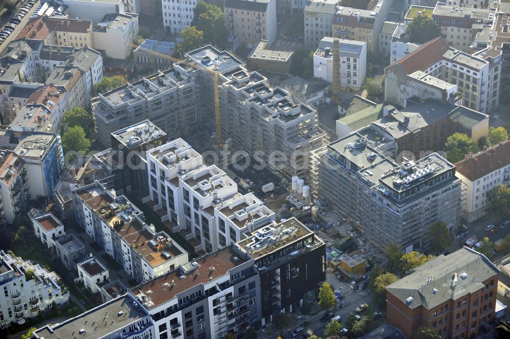 Berlin from the bird's eye view: Blick auf die Baustelle des Wohnneubaugebiet Marthashof an der Schwedter Straße im Stadtteil Prenzlauer Berg. Der Neubau ist ein Projekt der STOFANEL Investment AG , Projektsteuerer die city Bauten mbH, Baufirma die ALPINE Bau Deutschland. View of the residential development area „Marthashof Urban Village“ at the Berlin - district Prenzlauer Berg.