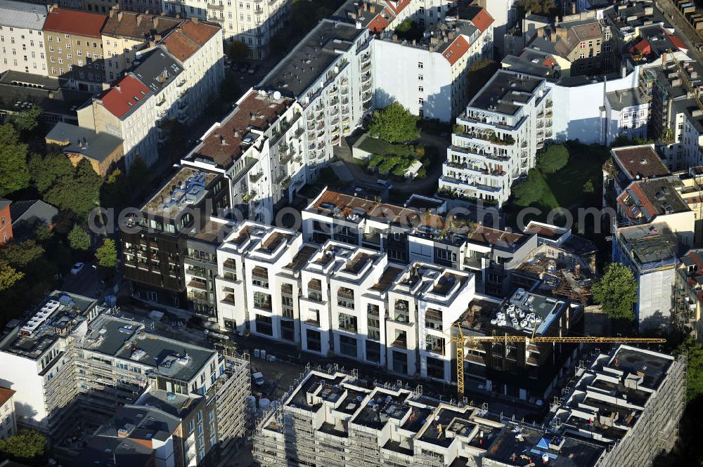 Aerial photograph Berlin - Blick auf die Baustelle des Wohnneubaugebiet Marthashof an der Schwedter Straße im Stadtteil Prenzlauer Berg. Der Neubau ist ein Projekt der STOFANEL Investment AG , Projektsteuerer die city Bauten mbH, Baufirma die ALPINE Bau Deutschland. View of the residential development area „Marthashof Urban Village“ at the Berlin - district Prenzlauer Berg.