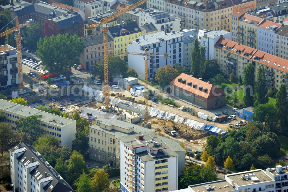 Aerial photograph Berlin Mitte - Baustelle für das Wohnneubauobjekt Residence Garden an der Gartenstraße in Berlin - Mitte durch die NCC Deutschland GmbH. Hier entstehen Eigentumswohnung mit gehobener Ausstattung im Romantikerviertel von Mitte. Views of the city built the new headquarters Residence Garden in Berlin-Mitte.