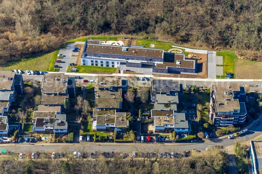 Hattingen from the bird's eye view: Residential area of the multi-family house settlement - Wohnpark Hoelter Busch with a new building of a kindergarten in Hattingen at Ruhrgebiet in the state North Rhine-Westphalia, Germany