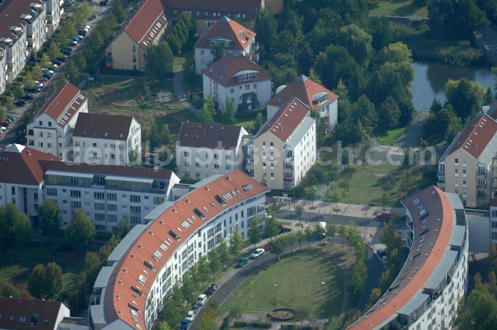 Aerial photograph Berlin - Blick auf Mehrfamilienhäuser zwischen Schönerlinder Weg, der Autobahn A10 / E65, Karestraße und der Bucher Chaussee in Berlin-Karow-Nord.