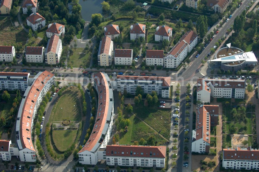 Aerial photograph Berlin - Blick auf Mehrfamilienhäuser zwischen Schönerlinder Weg, der Autobahn A10 / E65, Karestraße und der Bucher Chaussee in Berlin-Karow-Nord.