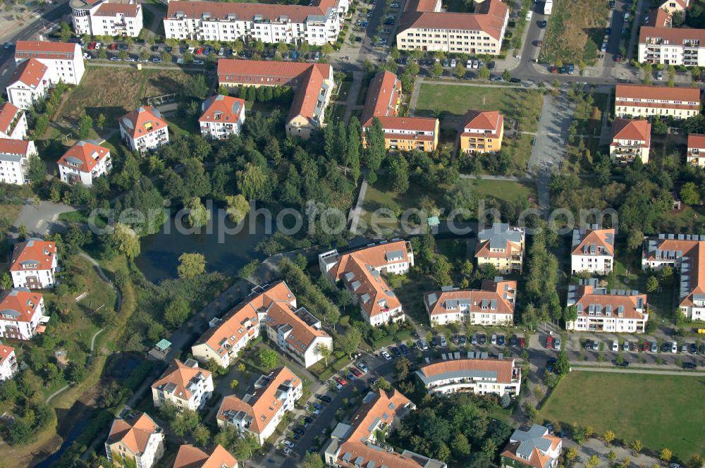 Aerial image Berlin - Blick auf Mehrfamilienhäuser zwischen Schönerlinder Weg, der Autobahn A10 / E65, Karestraße und der Bucher Chaussee in Berlin-Karow-Nord.