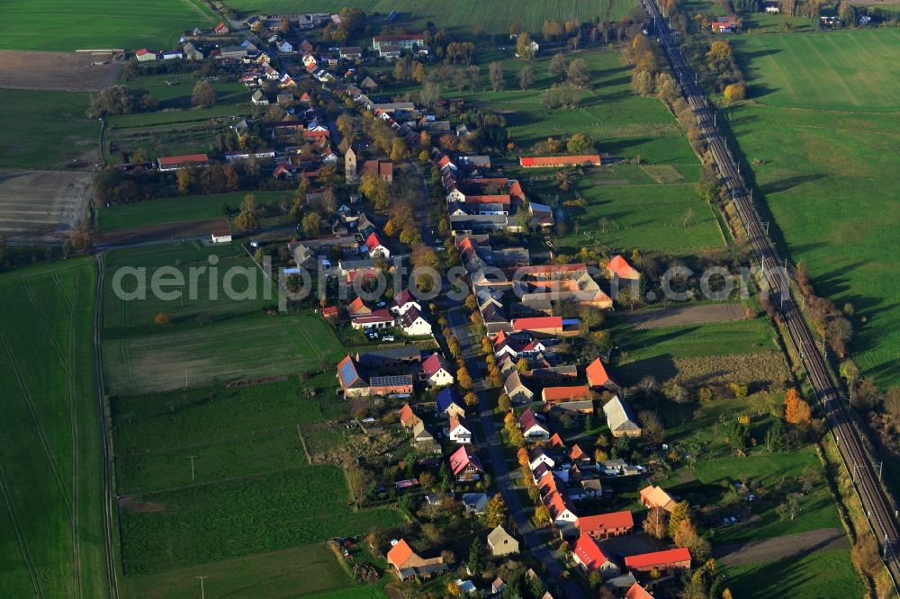 Löwenberger Land Gutengermendorf from above - Small residential area with village character in the district Gutengermendorf in Löwenberger Land in Brandenburg. There are family houses surrounded by fields and arable land