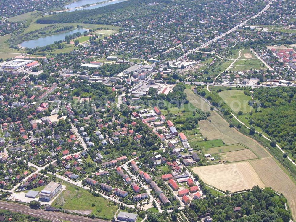 Aerial photograph Berlin - Blick auf Berlin-Kaulsdorf. Blick auf Kaulsdorf. Im Vordergrund ist der Wohnsiedlungsneubau der PREMIER-Deutschland GmbH, an der Dorfstr. Am Alten Dorfanger in Berlin-Kaulsdorf zu sehen