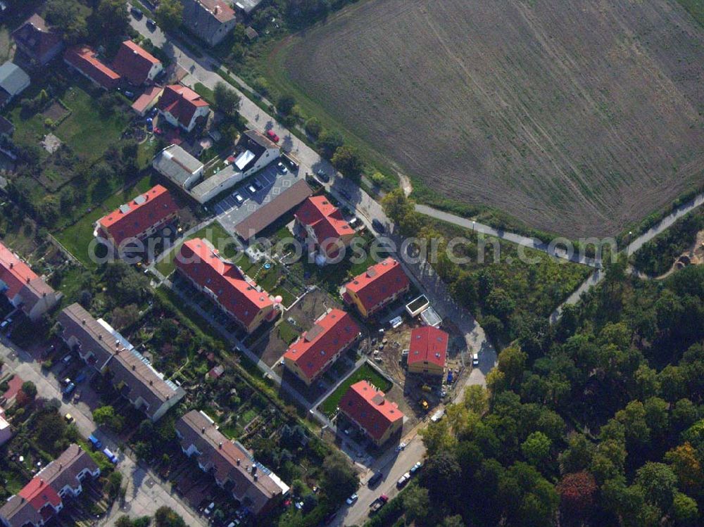 Berlin-Kaulsdorf from the bird's eye view: 05.10.2005 Berlin-Kaulsdorf Wohnsiedlungsneubau der PREMIER-Deutschland GmbH, an der Dorfstr. Am Alten Dorfanger in Berlin-Kaulsdorf