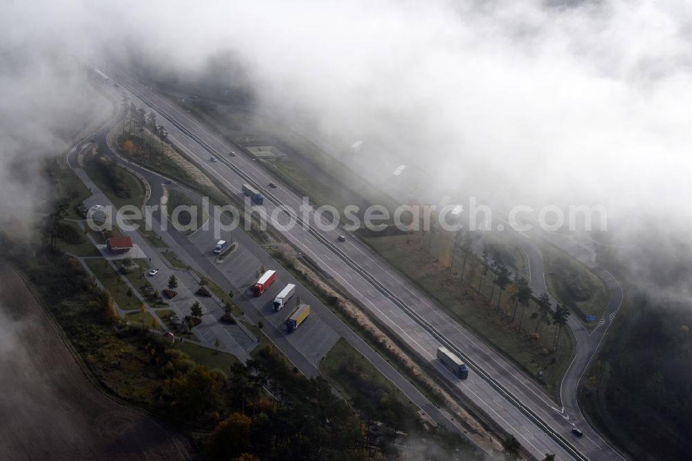 Aerial image Spreenhagen - Routing and traffic lanes during the motorway service station and parking lot of the BAB A 12 E30 fuer LKW Lastkraftfahrzeuge im Gueterverkehr in Spreenhagen in the state Brandenburg