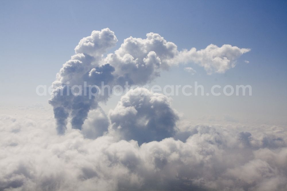 Lippendorf from above - Clouds - formation by steam rise of the cooling towers at Lippendorf in Saxony