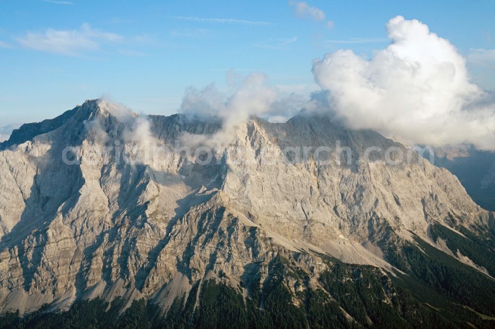 Garmisch-Partenkirchen from above - Cloud Covered summit of the Zugspitze mountain in the Alps near Garmisch-Partenkirchen in Bavaria