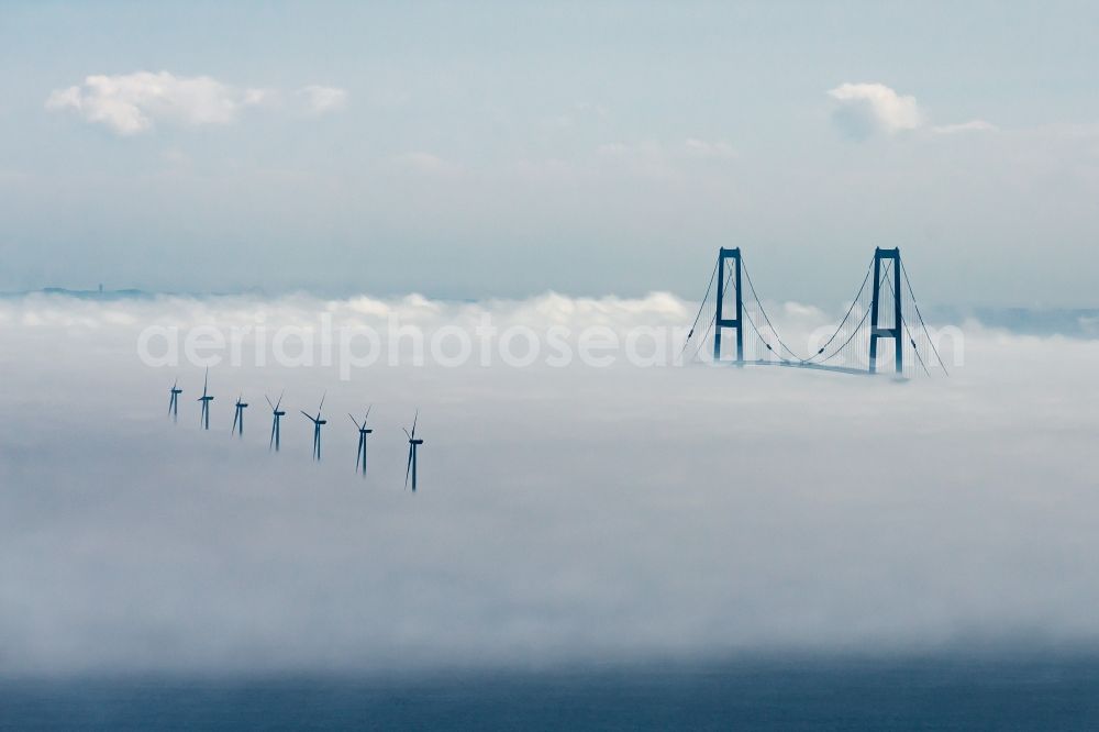 Korsoer from the bird's eye view: Cloud and high fog layer over the bridge over the Great Belt in Korsoer in Syddanmark, Denmark