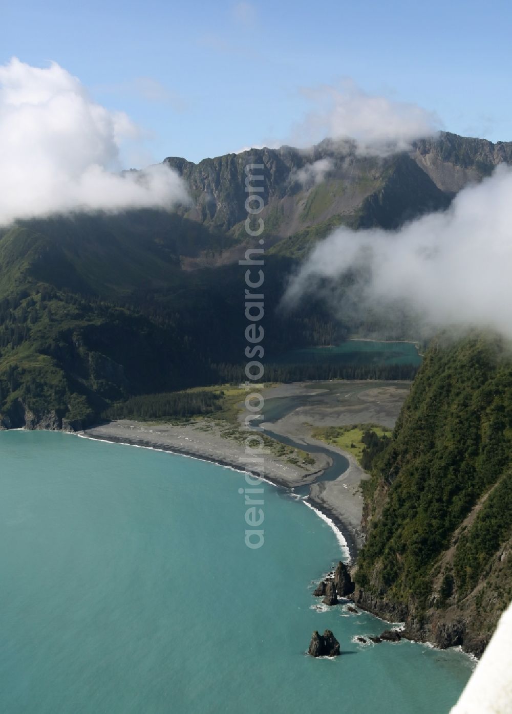 Aerial photograph Kenai Fjords National Park - Cloud-shrouded mountain ranges in Seward Kenai Fjords National Park on the Kenai Peninsula in Alaska in the United States of America USA