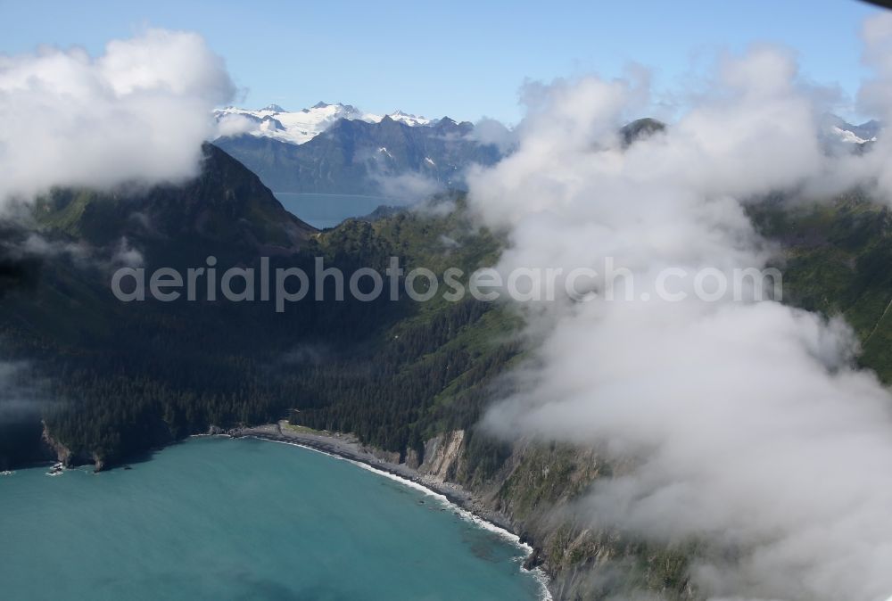 Kenai Fjords National Park from the bird's eye view: Cloud-shrouded mountain ranges in Seward Kenai Fjords National Park on the Kenai Peninsula in Alaska in the United States of America USA