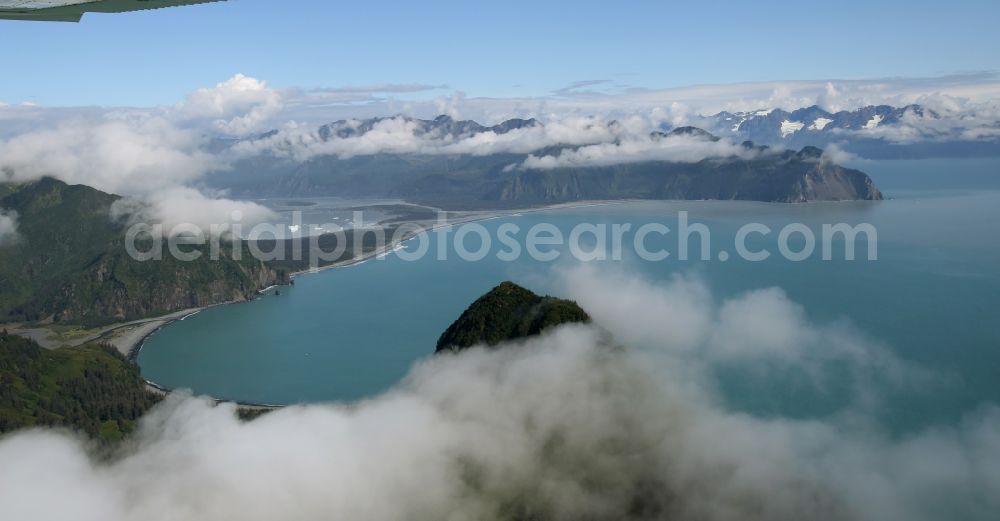 Aerial image Kenai Fjords National Park - Cloud-shrouded mountain ranges in Seward Kenai Fjords National Park on the Kenai Peninsula in Alaska in the United States of America USA