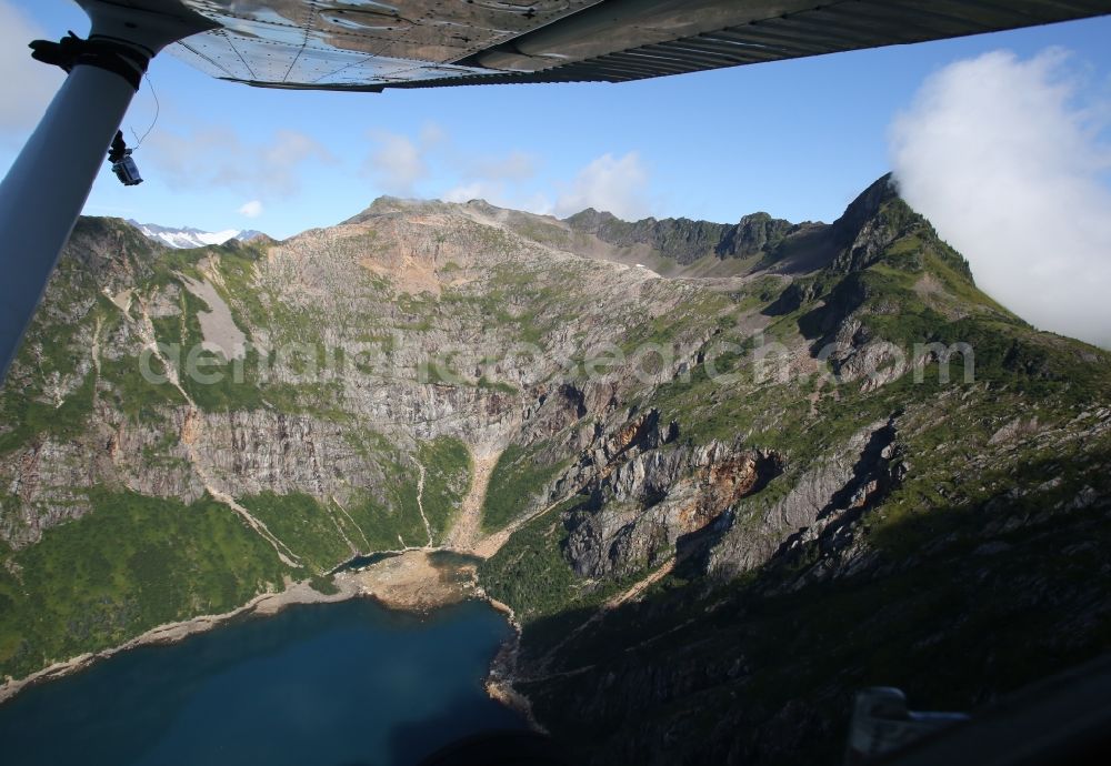 Aerial photograph Kenai Fjords National Park - Cloud-shrouded mountain ranges in Seward Kenai Fjords National Park on the Kenai Peninsula in Alaska in the United States of America USA