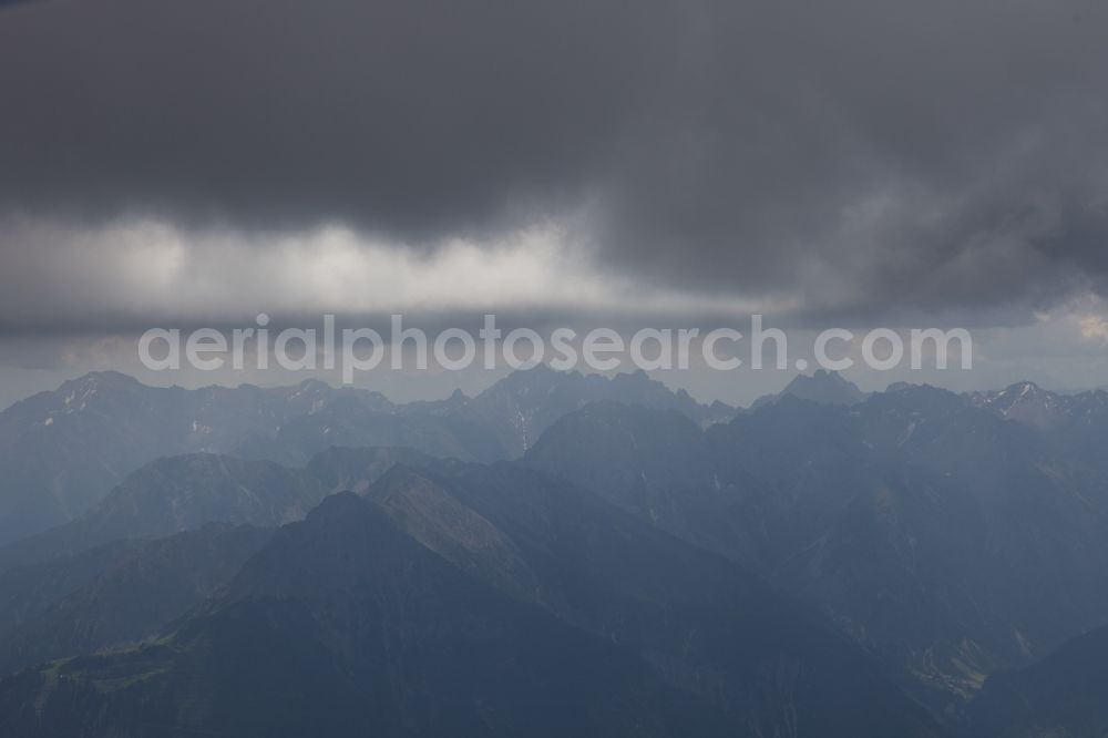 Pians from the bird's eye view: Cloud-shrouded landscape of the Lech Valley Alps in Tyrol Pians in Austria