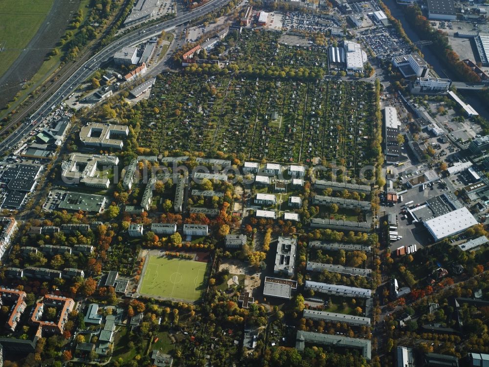 Berlin from above - Residential area and area of allotements in the South of federal motorway A100 and along Komturstrasse in the Tempelhof part of Berlin in Germany. Apart from the estates and allotements, there are several commercial, industrial and company compounds