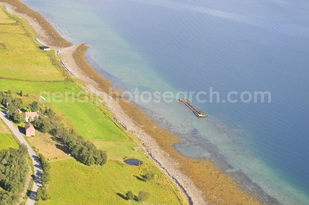 Aerial image Tromso - Wreck - remains of the former German battleship Tirpitz on the beach of the island Hakoya in Tromso, Norway