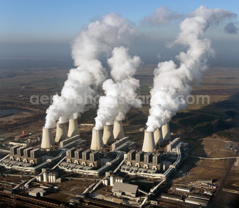 Aerial photograph Jänschwalde - Clouds of exhaust gas in the cooling towers of the power plant Jaenschwalde, a lignite-fired thermal power plant in southeastern Brandenburg. Power plant operator is to Vattenfall Europe belonging Vattenfall Europe Generation AG, which emerged from VEAG