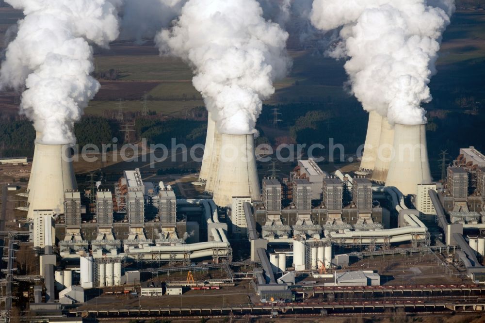 Aerial photograph Jänschwalde - Clouds of exhaust gas in the cooling towers of the power plant Jaenschwalde, a lignite-fired thermal power plant in southeastern Brandenburg. Power plant operator is to Vattenfall Europe belonging Vattenfall Europe Generation AG, which emerged from VEAG